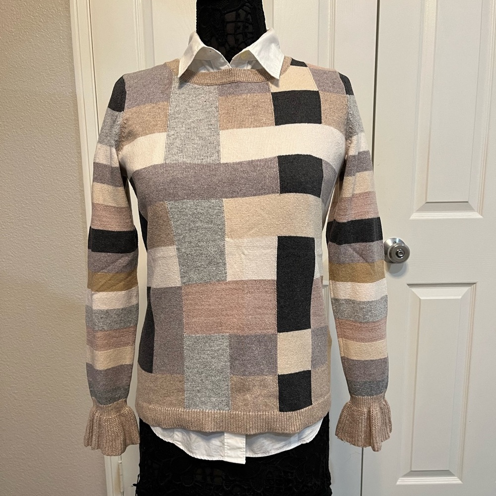 Loft plaid crew neck sweater with ruffle on sleeve. Size small